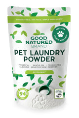 Good Natured Brand Detergente Mascotas, botella vertiendo, elimina olores y aroma a menta.