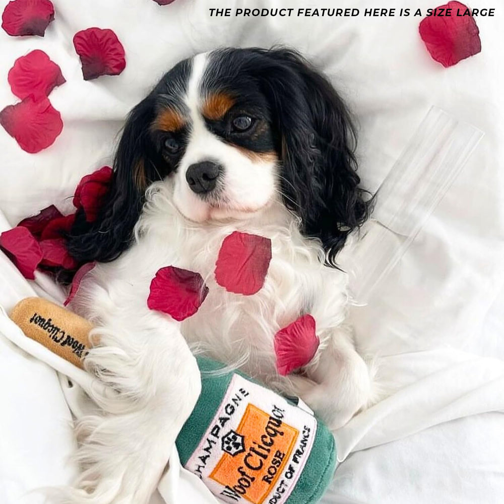 Juguete Woof Clicquot Rosé tamaño grande para razas medianas y grandes.