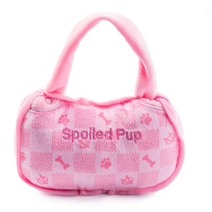 Juguete peluche interactivo Chewy Vuiton con chirrido para perros activos.