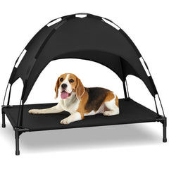 Cama de perro elevada Heeyoo con dosel para descanso fresco al aire libre.