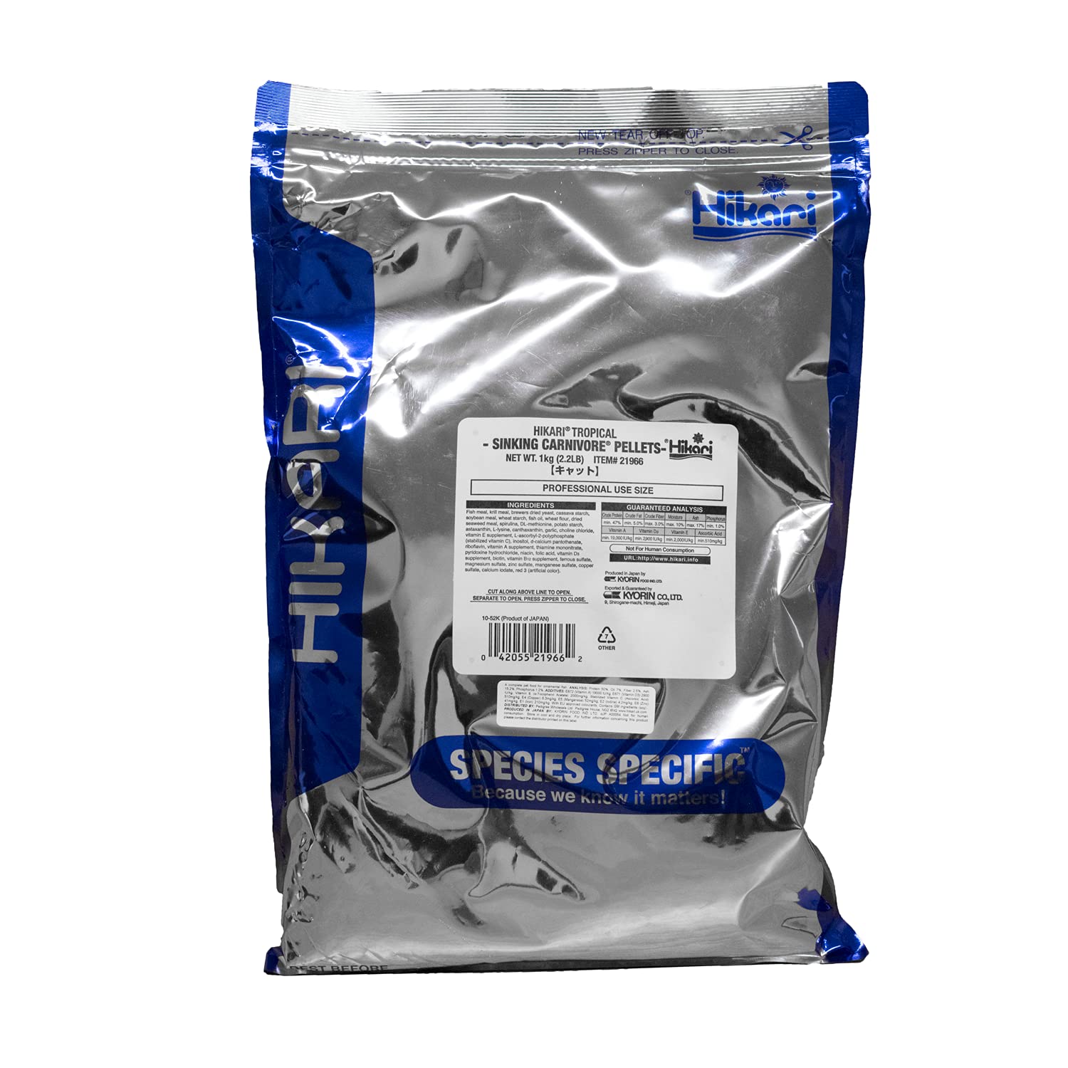 Hikari pellets carnívoros hundidos tropicales para acuario, realzan colores y nutrición.