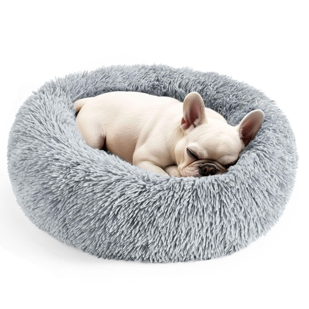 Hoewina cama donut para mascotas con bordes elevados ofrece confort y apoyo.