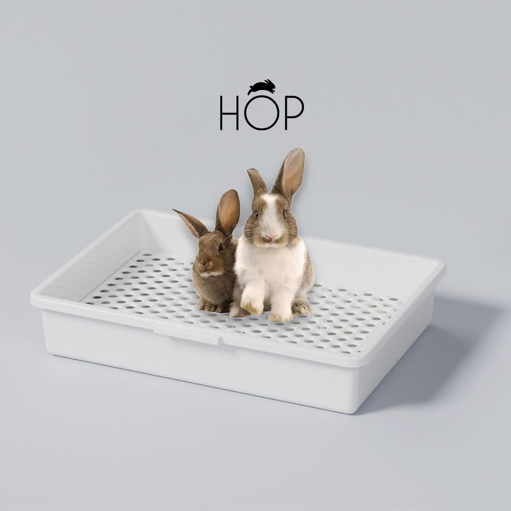Bandeja antisalpicaduras HOP para caja de conejo, convivencia limpia y sin derrames.