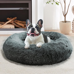 Cama tipo dona JOLLYVOGUE en azul marino para descanso cómodo.