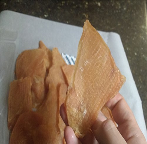 Just Jerky Treats textura suave y masticable, ideal para entrenamiento y juegos.