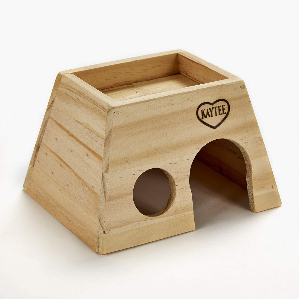 Kaytee Woodland Get-A-Way Medium refugio natural para hámsters, proporcionando seguridad.