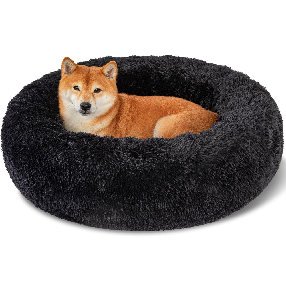 Cama Kimpets para perro redonda en negro, descanso cómodo y envolvente.