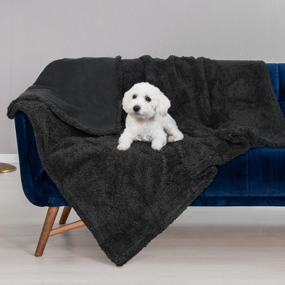 Manta impermeable para cama Kritter Planet, mantiene la cama limpia.