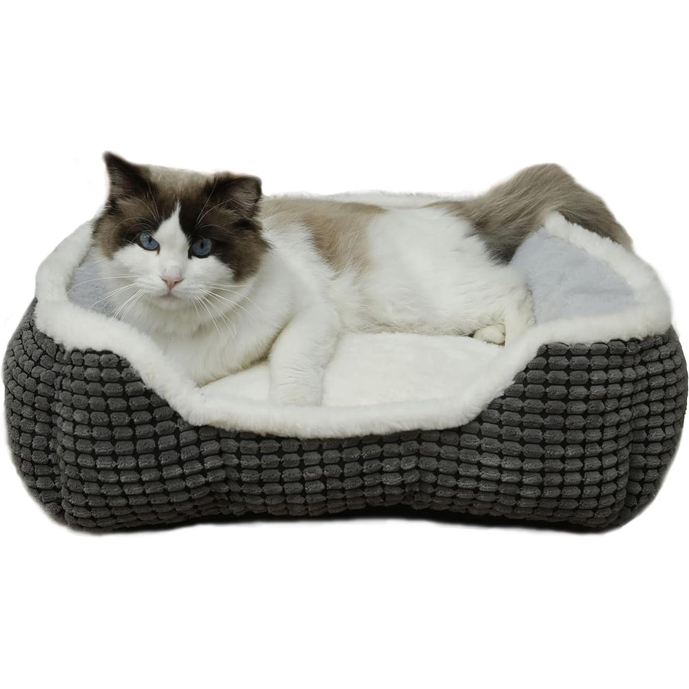 Cama mascota Laojin Balhen cuadrada gris con bordes elevados para descanso cómodo.