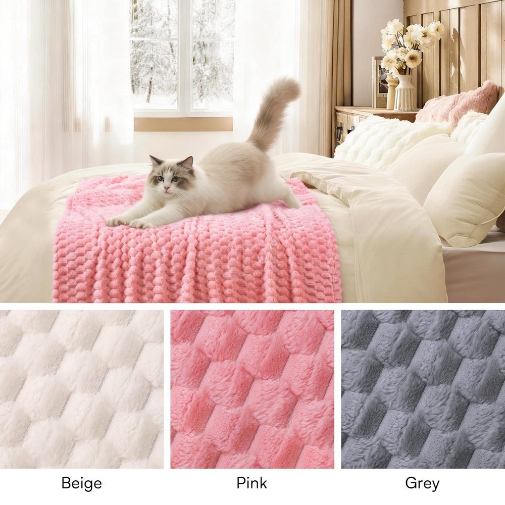 Luciphia Soft manta con diseño jacquard rosa, decoración elegante y protección del sofá.