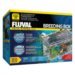 Marina Fluval Multi-Chamber colgado en el borde, aislando peces para cría.