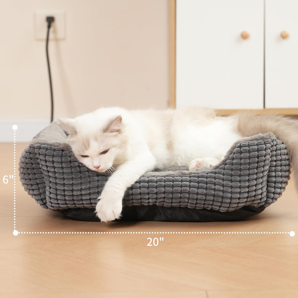 MARUNDA cama para gatos con tejido plush gris, textura suave y acogedora.