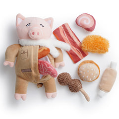 Juguete cerdito relleno de Nocciola para perros, ideal para explorar y masticar.
