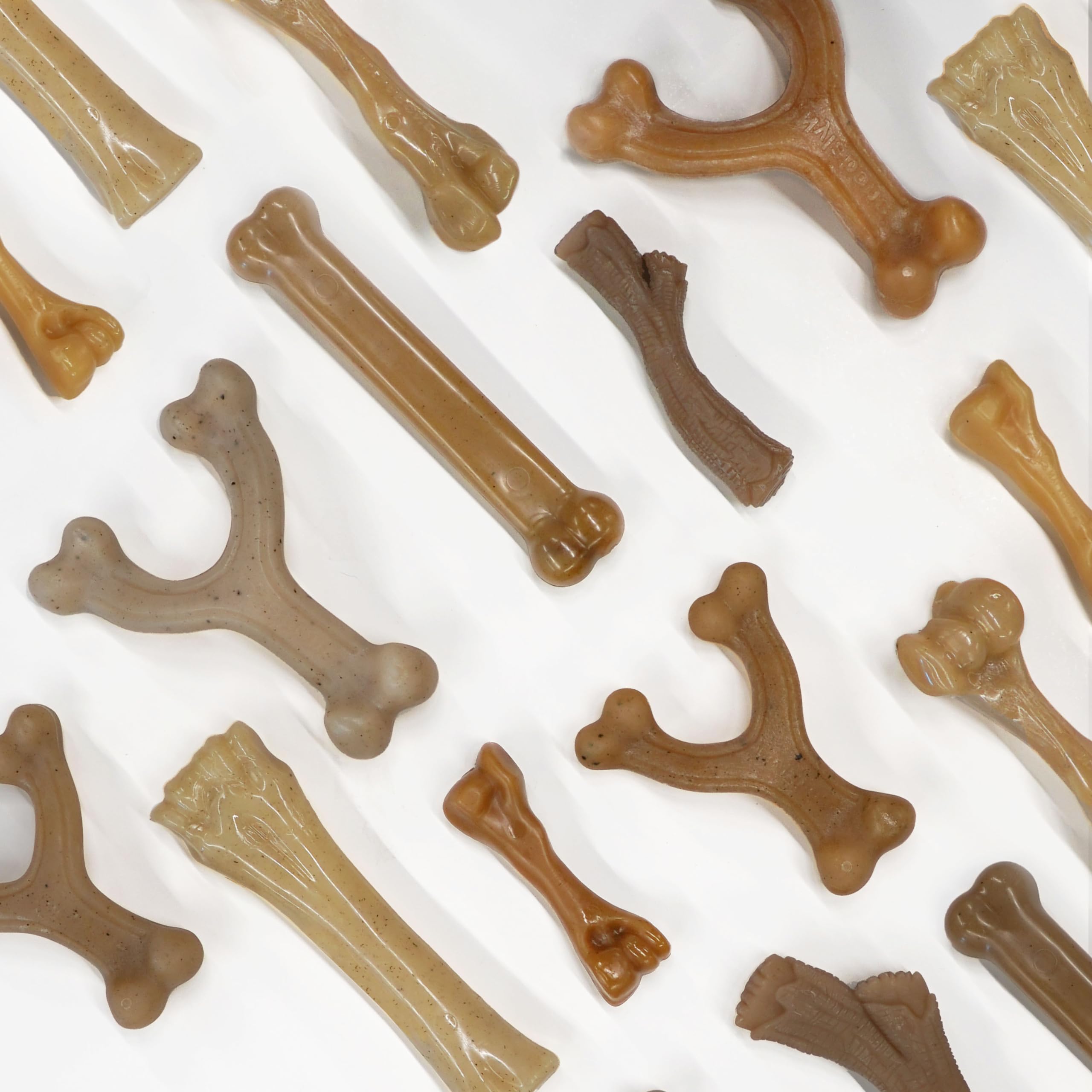 Nylabone Texturas Gourmet: variedad de texturas para mantener interés y masticar.