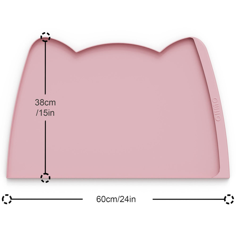 Alfombrilla OHMO rosa con bordes altos para evitar derrames y facilitar limpieza.