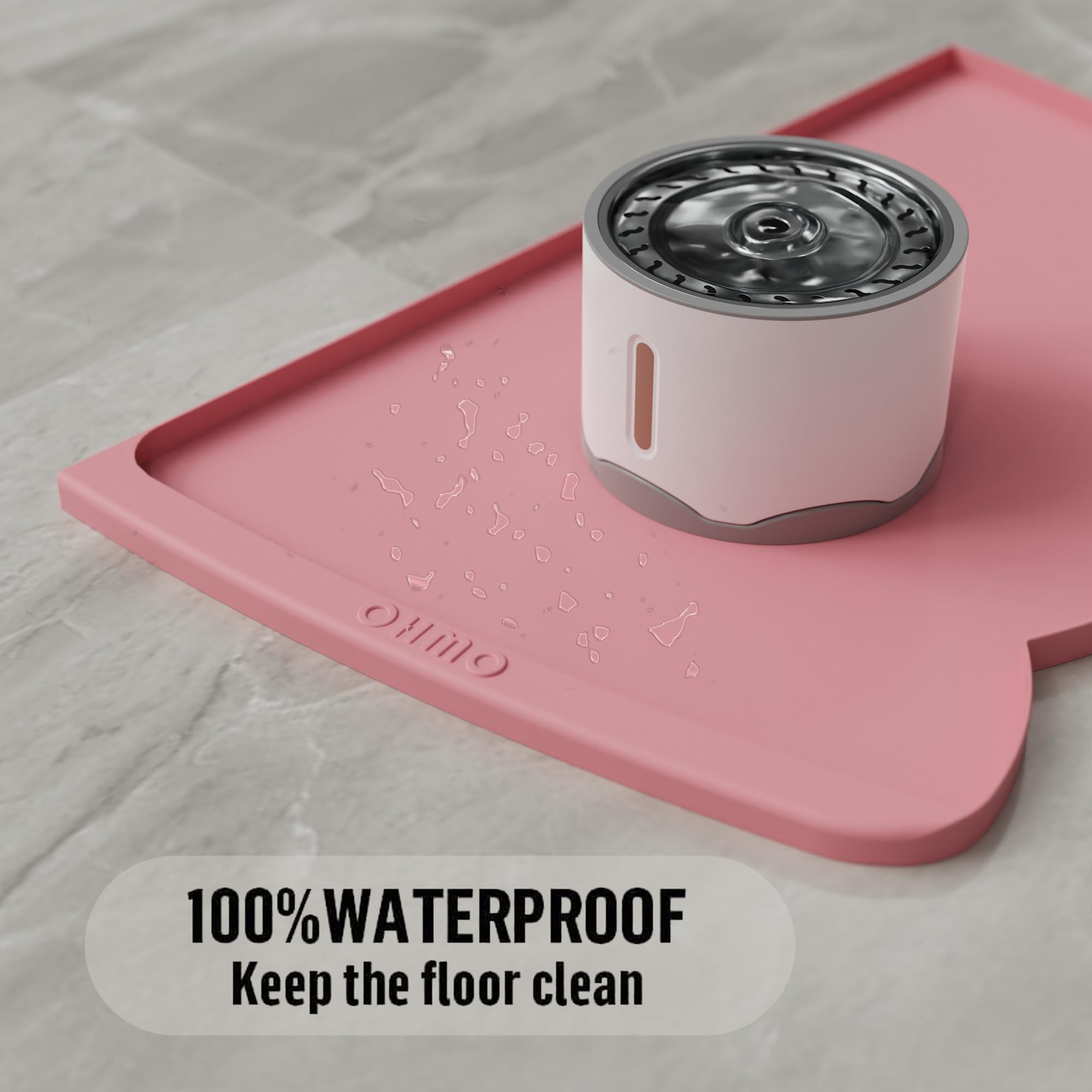 Alfombrilla impermeable OHMO rosa protege el suelo durante las comidas.