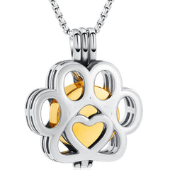 Collar-urna de Oinsi para cenizas de mascotas, elegante y duradero en plata dorada.
