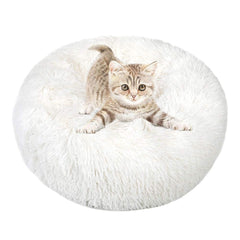 otoez cama en forma de dona para gatos y perros con base antideslizante que evita desplazamientos.