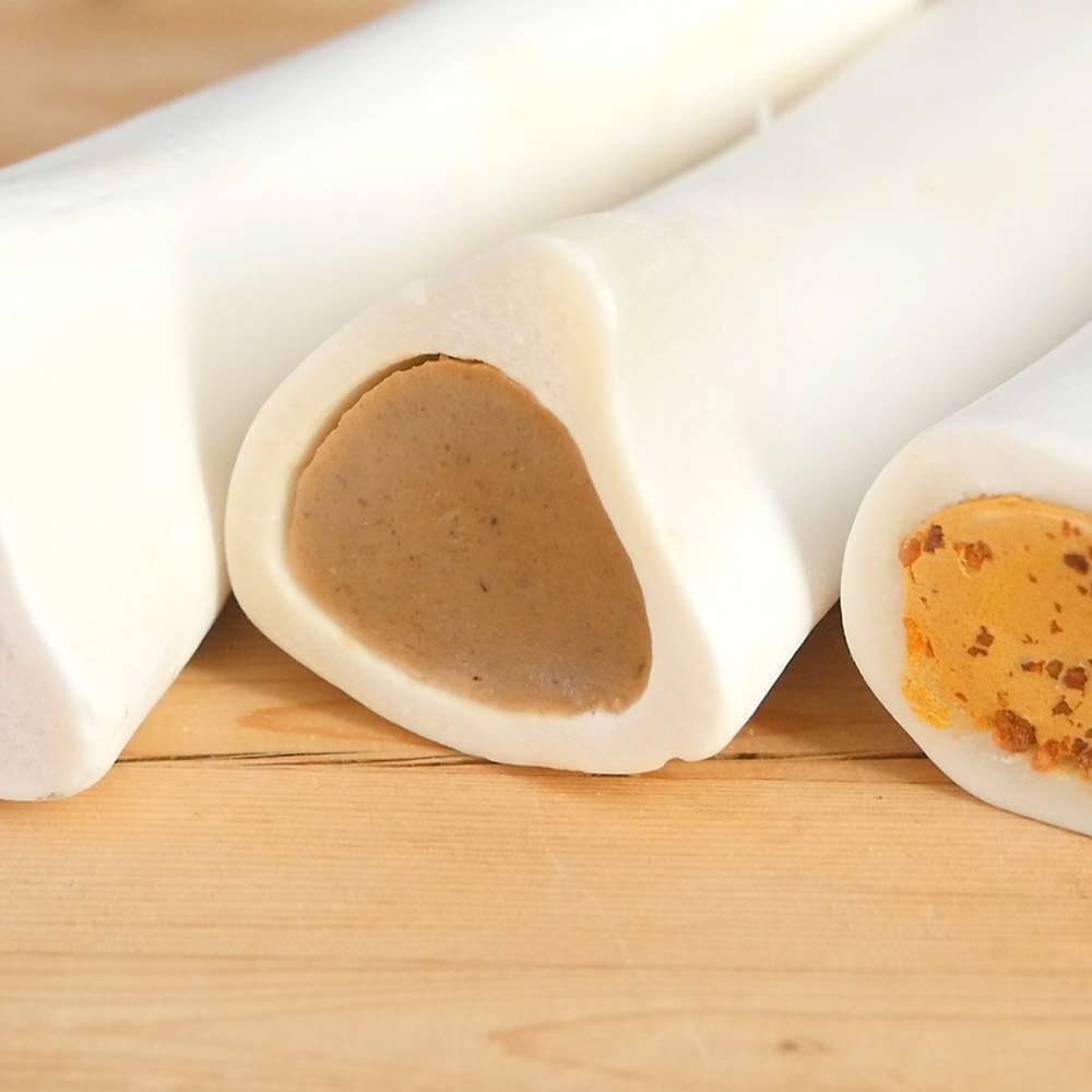 Pawstruck Hueso blanco relleno, textura dura y relleno sabroso para masticar.