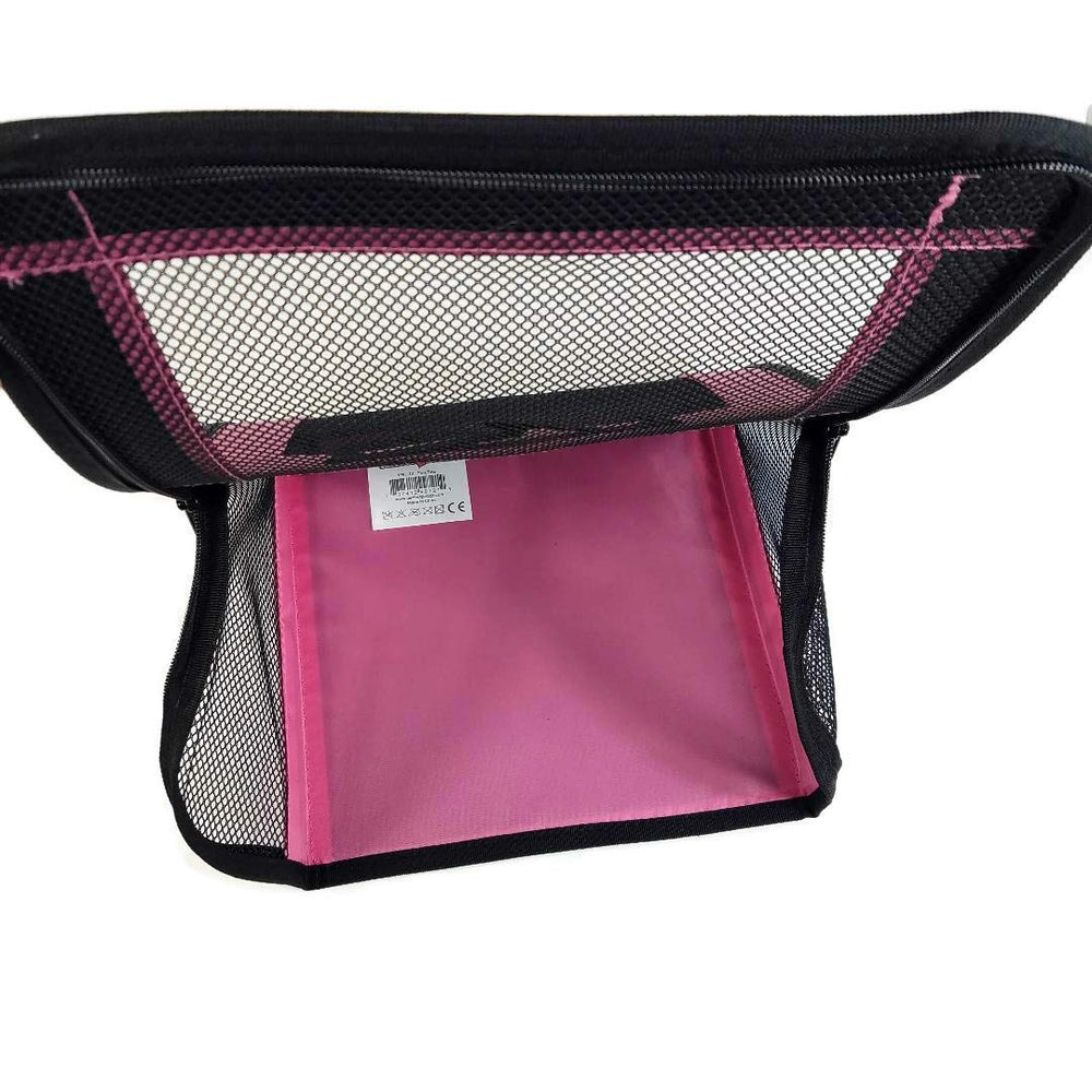 Tote Perfect Petzzz rosada con malla, muestra la mascota durante paseos.
