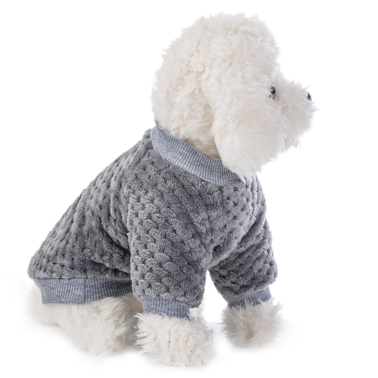 Detalle del tejido flannel suave de POMIU para mascotas.