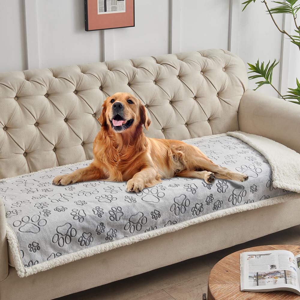 QEILS manta gris con huellas protege muebles gracias a su membrana impermeable.