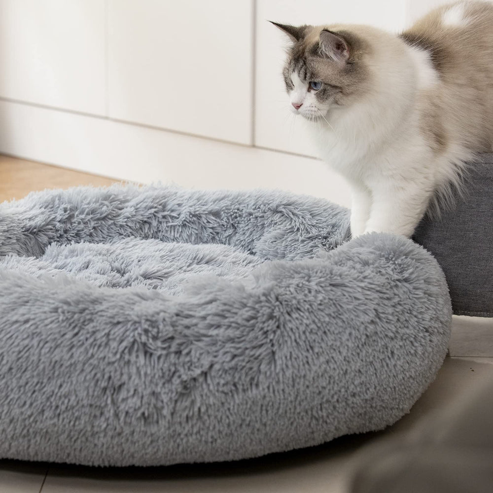 Raimaiso cama para mascotas con borde elevado, aporta soporte para cuello y cabeza.