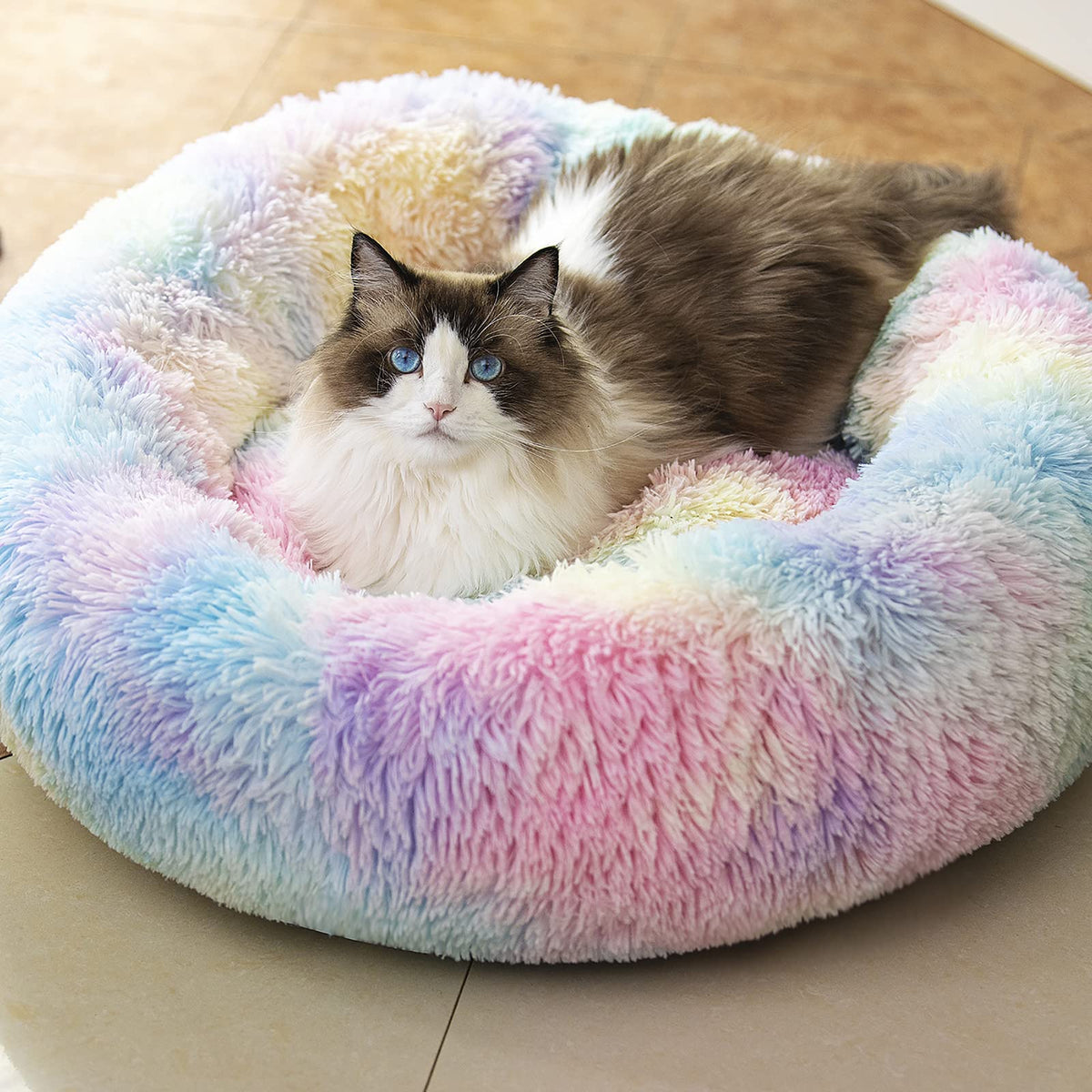 Cama Raimaiso redonda y peluche para mascotas, descanso cómodo.