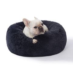 Cama para perros SAVFOX con forma de rosquilla para mayor tranquilidad durante el sueño.