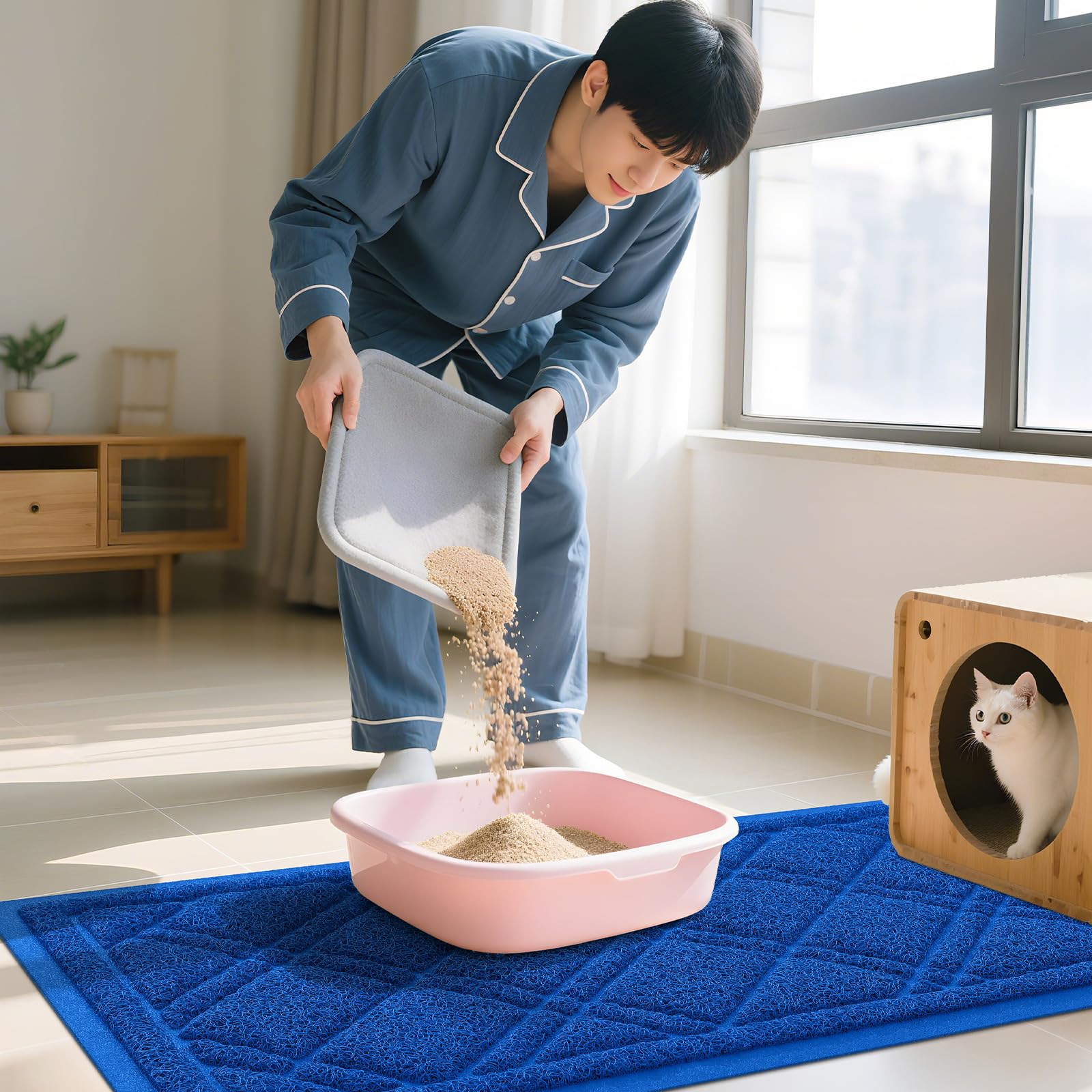 Alfombra Smiry para arenero 30x17 en interior, fácil de colocar en espacios reducidos.