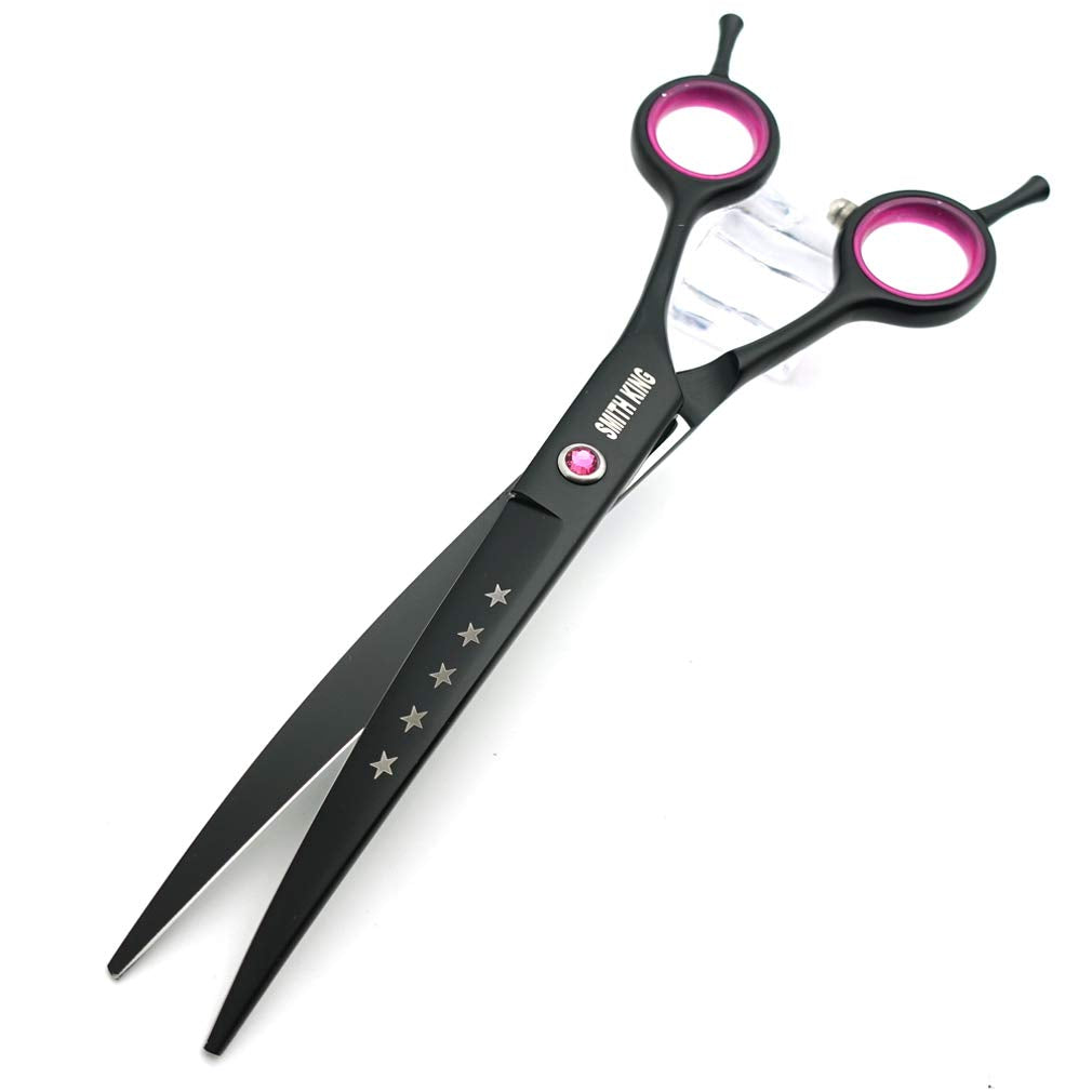 Manos sosteniendo tijeras Smith King con diseño ergonómico.