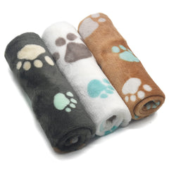Mantitas SORKUT para cachorros con huellas, ideal para descanso y juego.