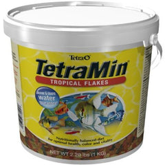 Tetramin Tropical Flakes: fórmula digestible para acuario limpio y agua clara.