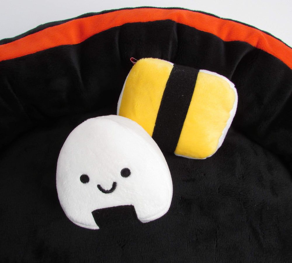 TONBO Sushi Bed: bordes acolchados para apoyar la cabeza cómodamente.