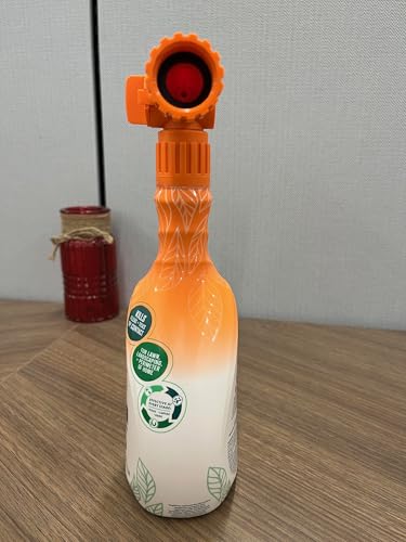 TropiClean aplicación alrededor de arbustos para cobertura amplia.