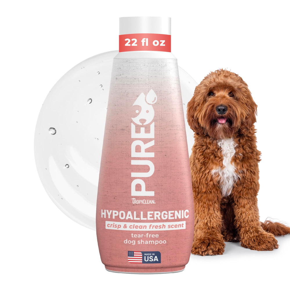 Champú TropiClean para cachorros, botella visible, limpieza suave para piel sensible.
