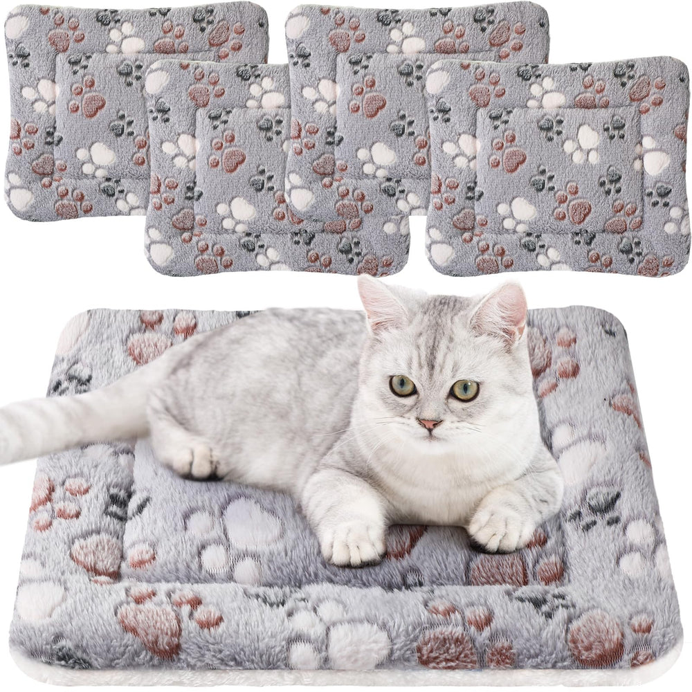 Cama para mascotas Tuanse con cuatro mantas grises, ideal para jaulas
