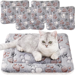 Cama para mascotas Tuanse con cuatro mantas grises, ideal para jaulas