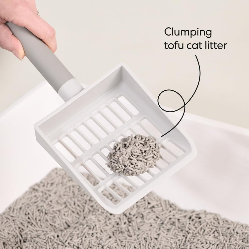 Tuft + Paw: arena de bajo rastro, menos arena en el piso.