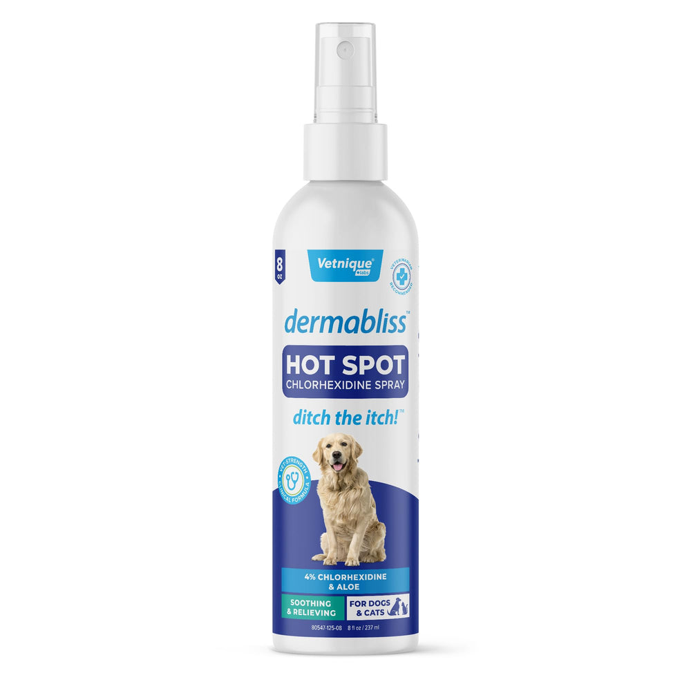 Dermabliss spray en aplicacion sobre la piel del perro para alivio suave.