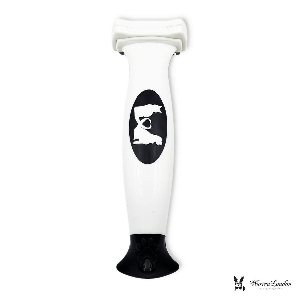 Cepillo deshedding compacto Warren London, diseño ergonómico para grooming rápido