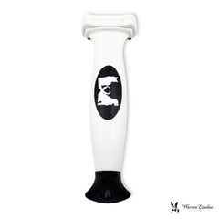Cepillo deshedding compacto Warren London, diseño ergonómico para grooming rápido