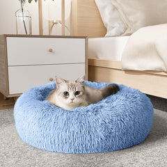 la marca Western Home WH, cama calmante para perro y gato, diseño envolvente para seguridad.