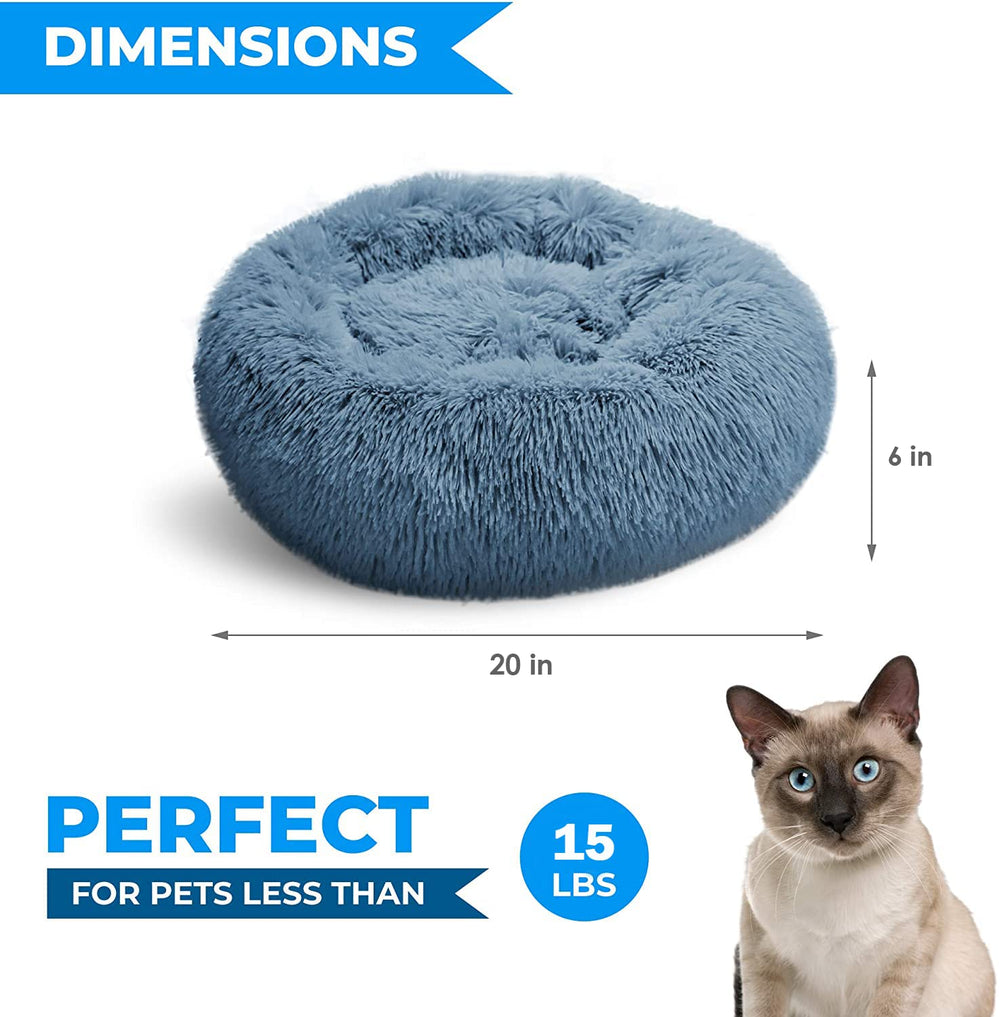 Whiskers & Friends: cama donut antiansiedad para gatos que favorece la relajación segura.