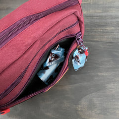 Riñonera Wilderdog Huckleberry con tres bolsillos para organización