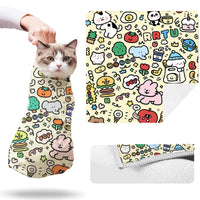 Wrap-gato: envoltorio de aseo fácil para uñas y pelaje, cómodo para el gato.