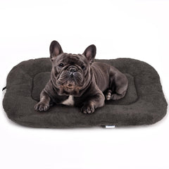 Cama para perro YUUHENG en jaula gris, descanso cómodo y seguro.