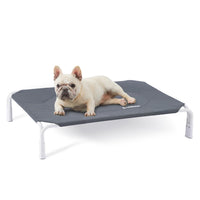 Cama para perros ZOMISIA elevada, montaje sin herramientas para instalación rápida.